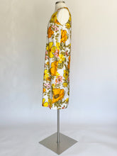 Load image into Gallery viewer, Vintage midi seath dress, floral pattern in yellow, orange and sage, side view